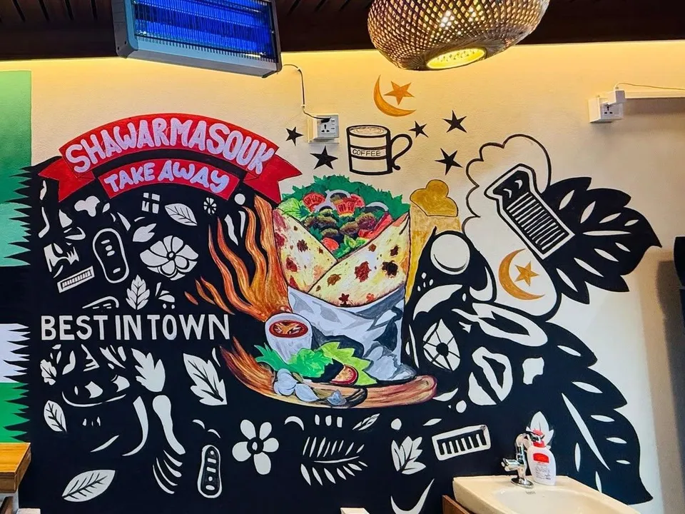 The Shawarma Souk mural inside the shop